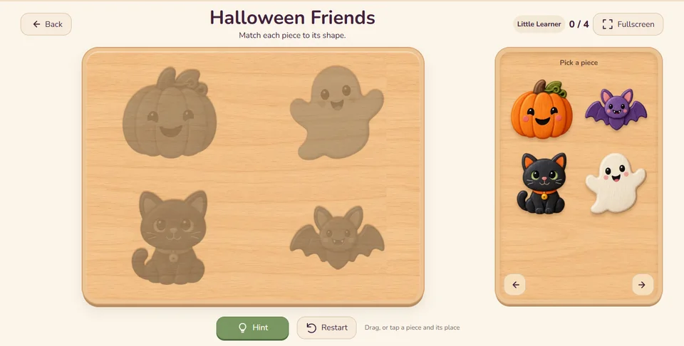 Loose Halloween puzzle pieces beside their matching places on the Halloween Friends board.